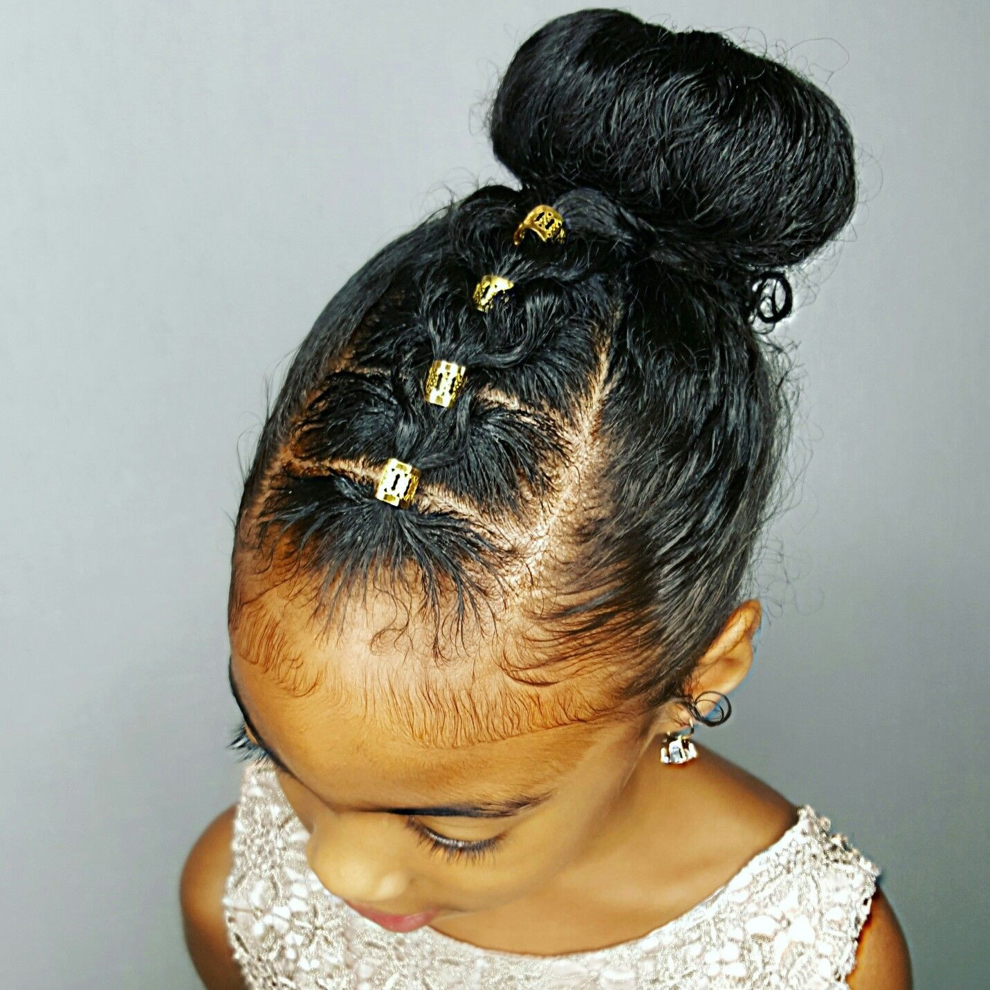 Best ideas about Bun Hairstyles For Kids
. Save or Pin Curly girl Bun updo Hairstyle for girls Now.