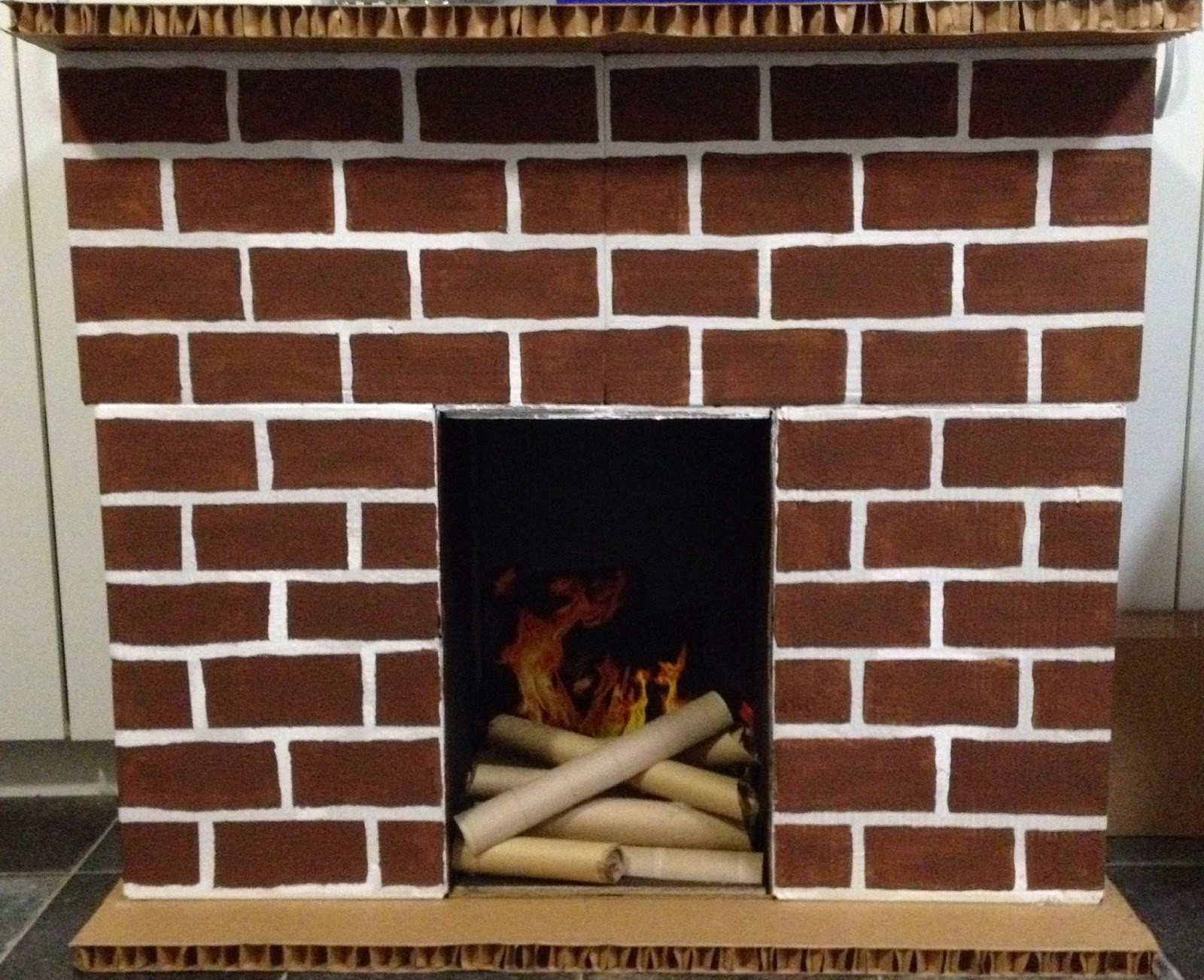 DIY Cardboard Fireplace
 Stick This DIY Cardboard Fireplace