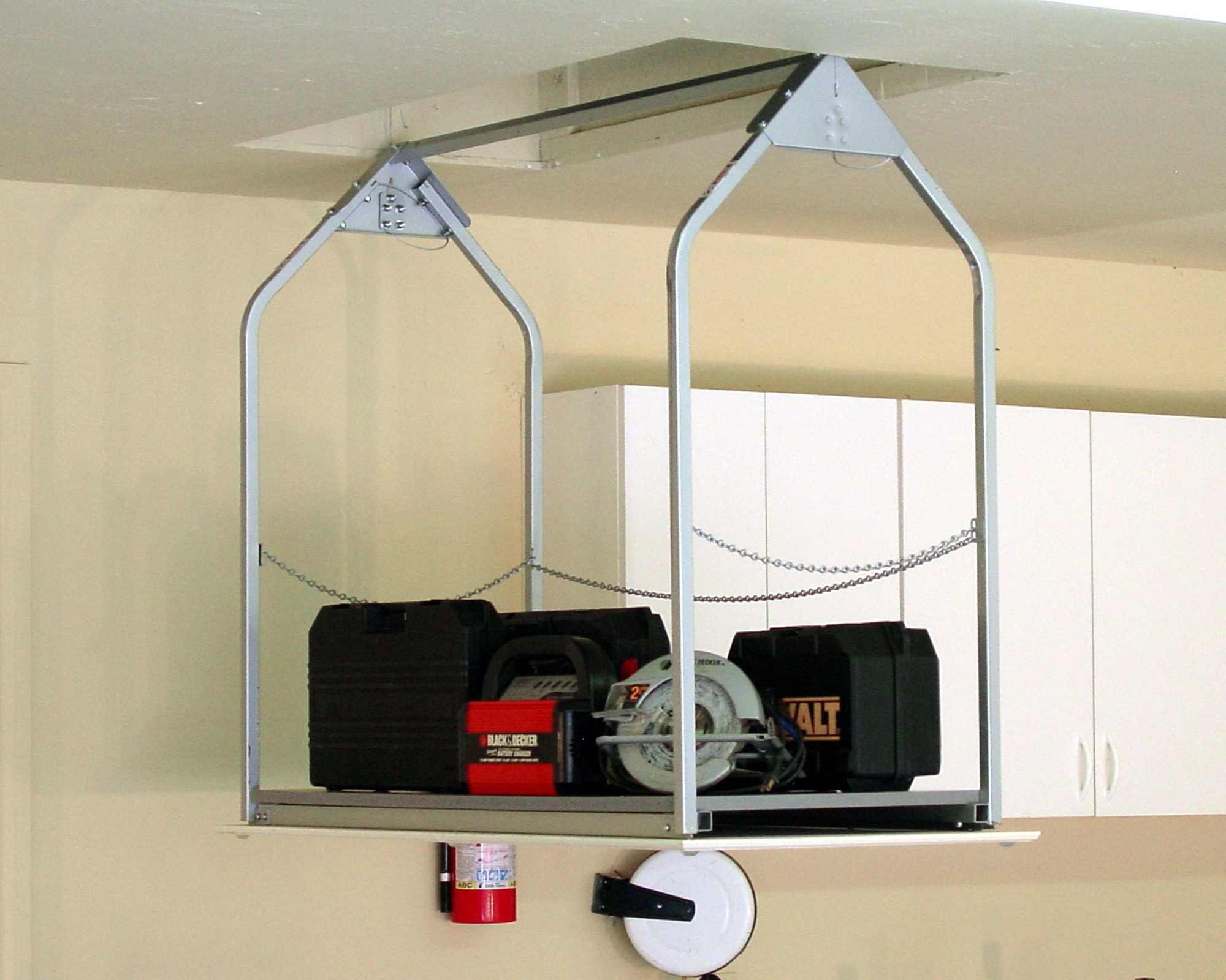 Best ideas about Garage Ceiling Storage Lift
. Save or Pin Attic Saddle Storage System • Attic Ideas Now.