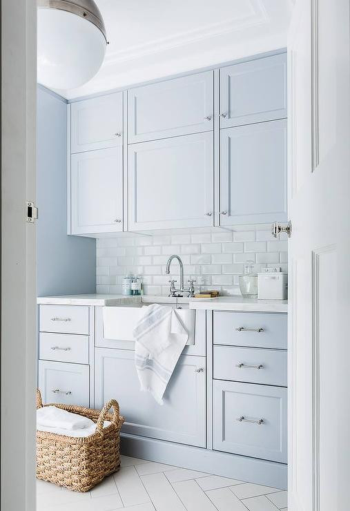 Best ideas about Laundry Room Tile
. Save or Pin Blue Laundry Room Cabinets with White Subway Tiles Now.