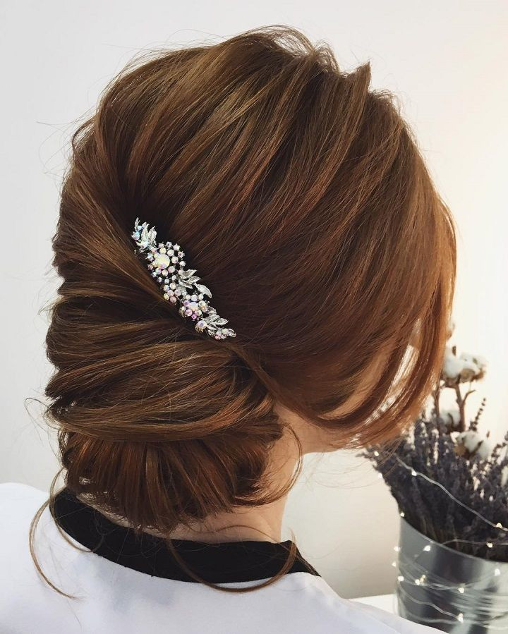 Updo Bun Hairstyle
 low bun twist updo hairstyle weddinghair updos