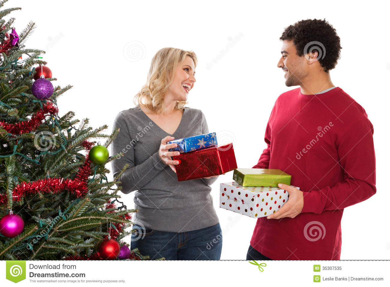 Wedding Gift Ideas For Middle Aged Couple
 Christmas Couple Giving Gifts Stock Image Image