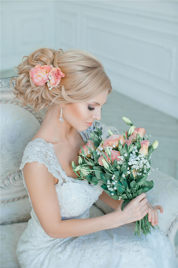 Wedding Hairstyle With Flowers
 20 Most Beautiful Updo Wedding Hairstyles to Inspire You