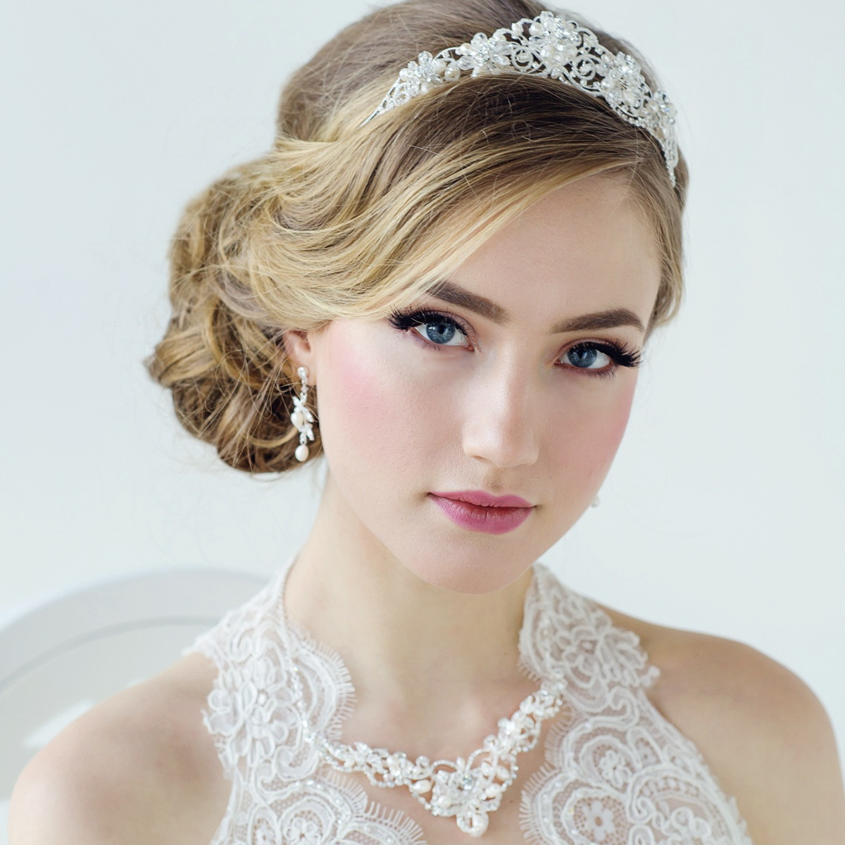 Wedding Hairstyles With Tiara
 Different Style Latest Wedding Tiara Designs for Brides