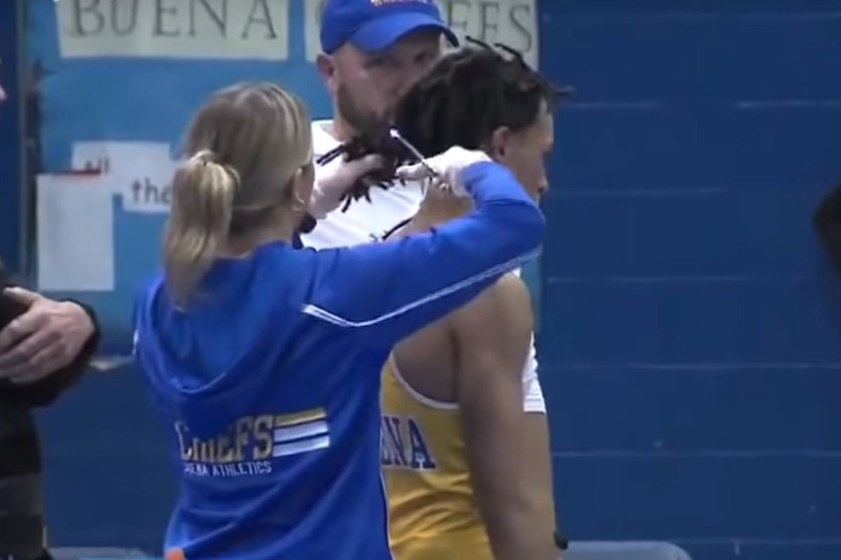Wrestler Forced To Cut Hair
 High school wrestler forced to cut off dreadlocks by