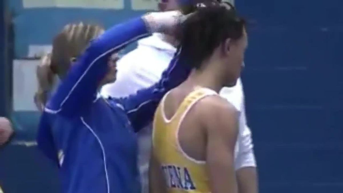Wrestler Forced To Cut Hair
 Wrestler forced to cut hair by referee with racist history