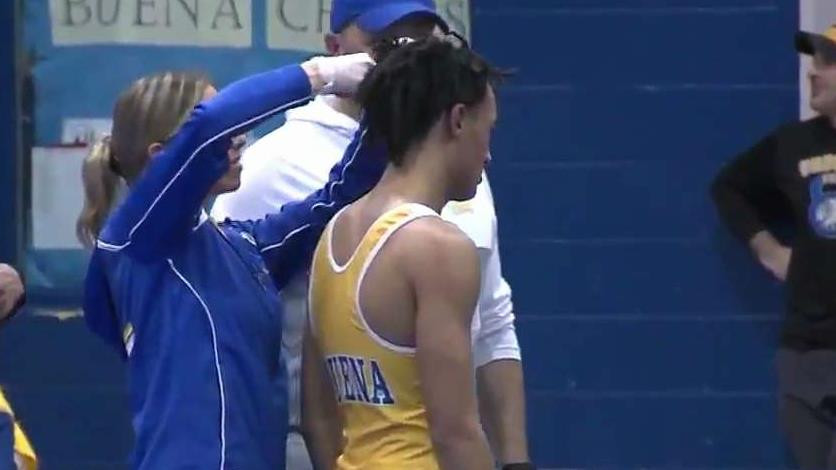 Wrestler Forced To Cut Hair
 High school wrestler forced to cut dreads or forfeit match