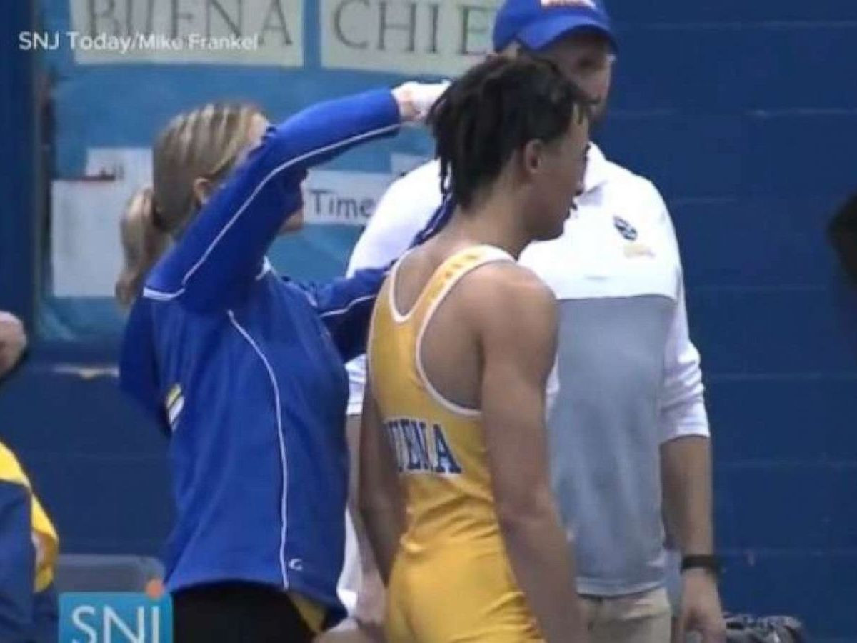 Wrestler Forced To Cut Hair
 High school wrestler reportedly forced to cut off