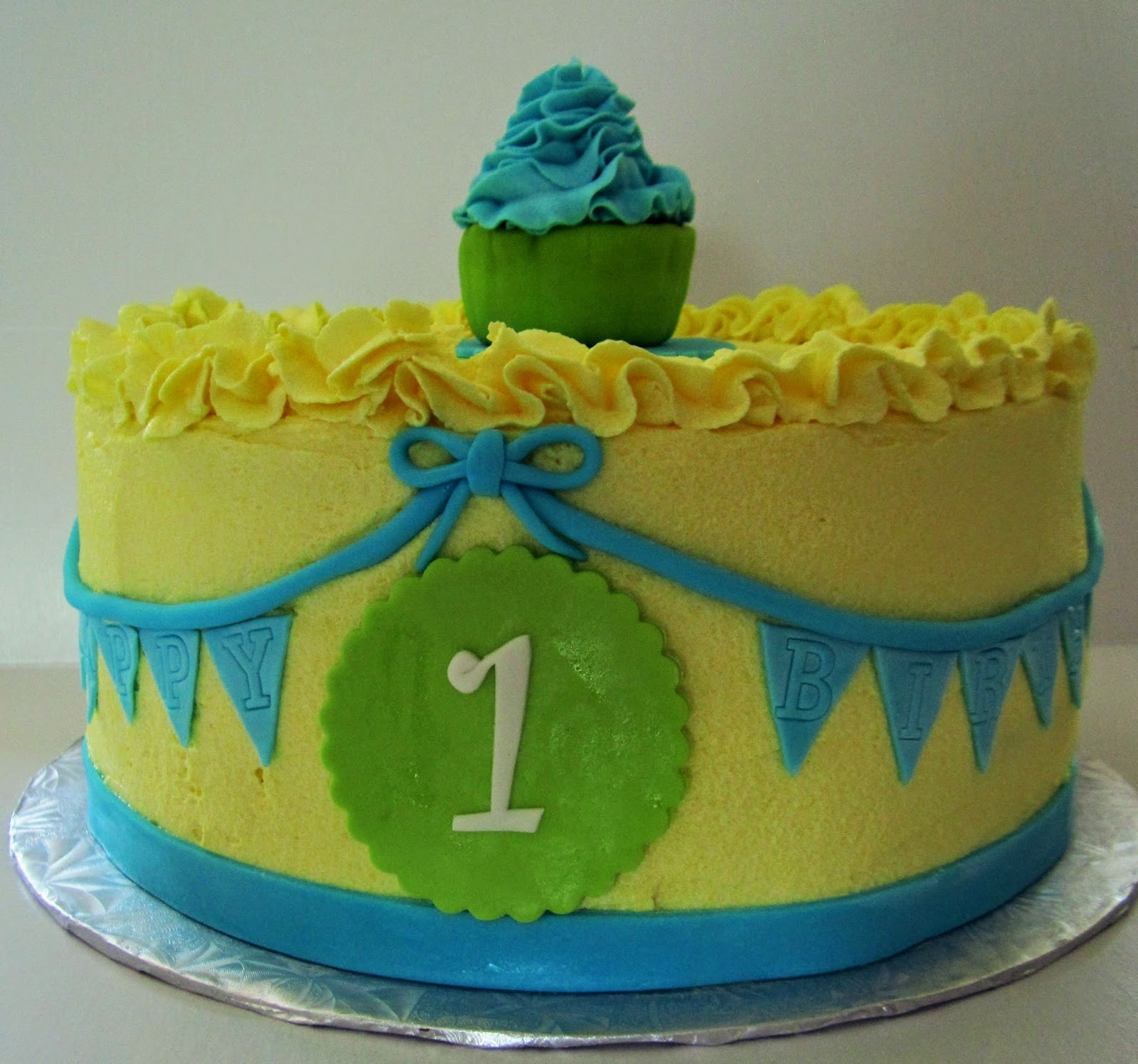 Yellow Birthday Cake
 Cakes Something Like That Yellow Green and Blue 1st