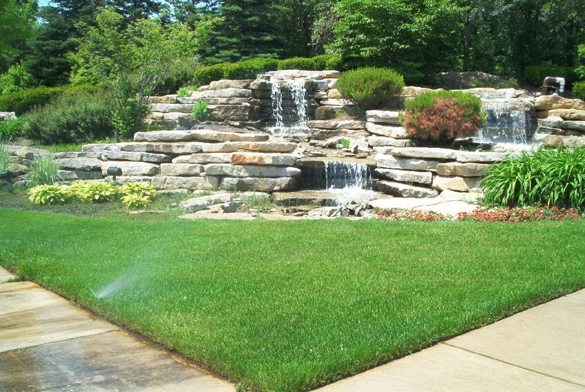 Best ideas about Backyard Waterfall Ideas
. Save or Pin Layered stone waterfall in a corner of a backyard Now.