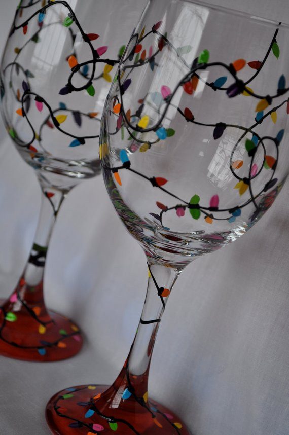 Best ideas about DIY Christmas Wine Glasses
. Save or Pin Hand Painted Christmas Lights Wine Glass Pair Now.