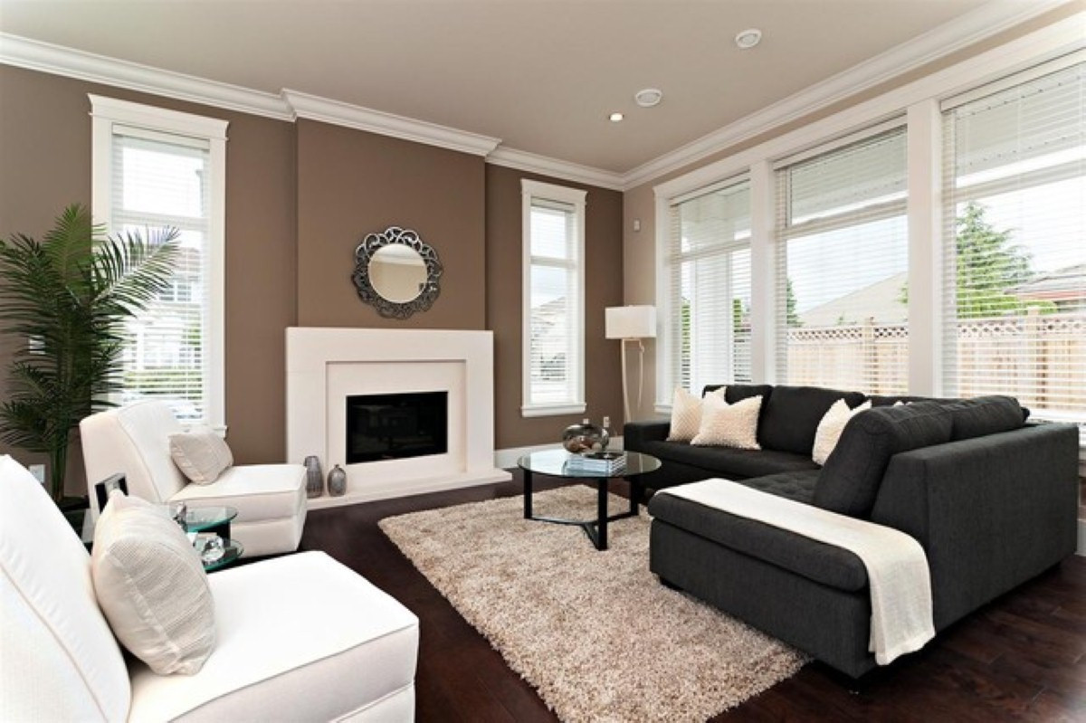 Best ideas about Family Room Wall Colors
. Save or Pin Cozy Living Room With Fireplace Under Antique Wall Mirrors Now.