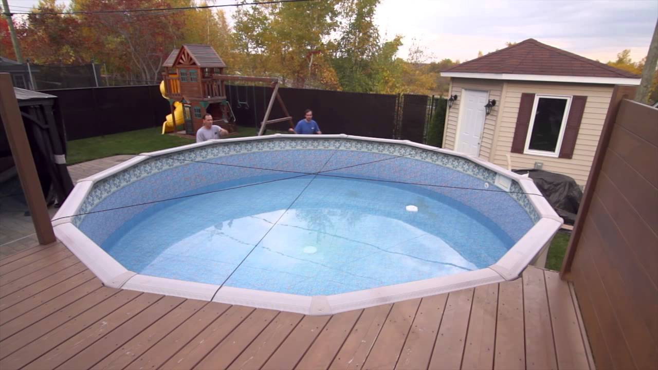 how to put cover on above ground pool