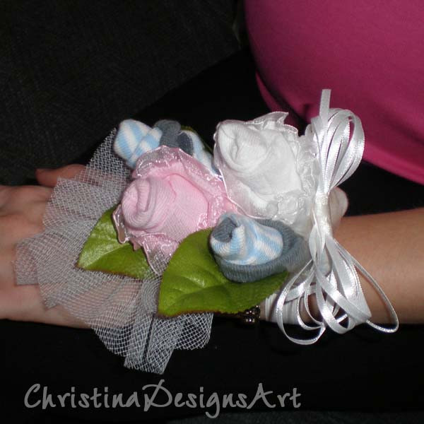 Best ideas about Baby Shower Corsage DIY
. Save or Pin Baby Shower Diaper Cakes & Sock Corsages Now.