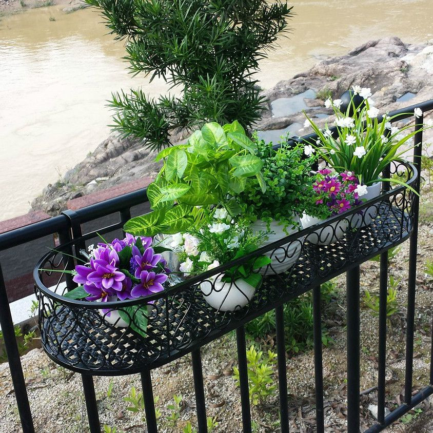 Best ideas about Balcony Hanging Planter
. Save or Pin Wrought iron railing fence flower pots hanging oval frame Now.