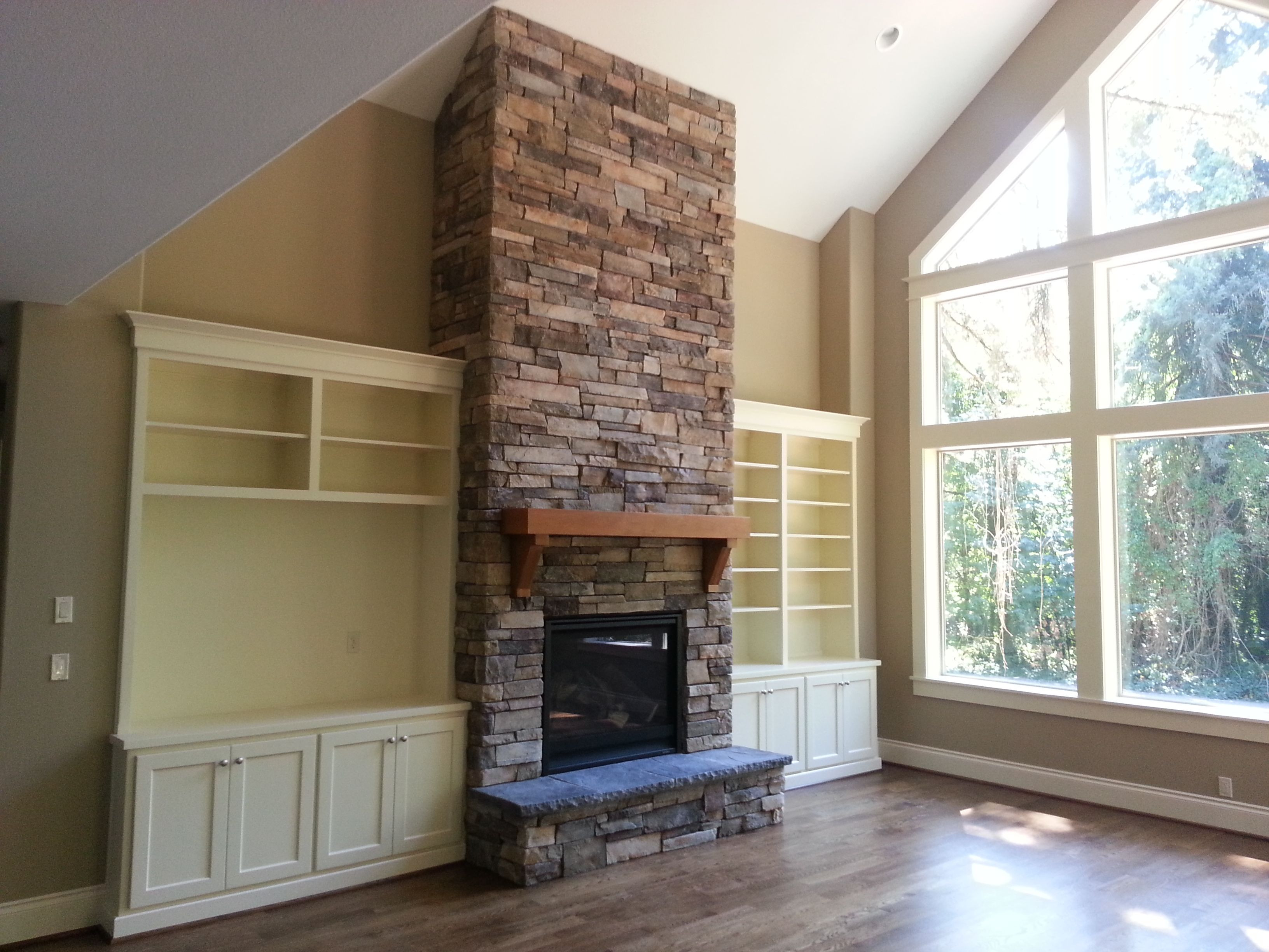 Best ideas about Built Ins Around Fireplace
. Save or Pin fireplace new construction cultured stone raised hearth Now.