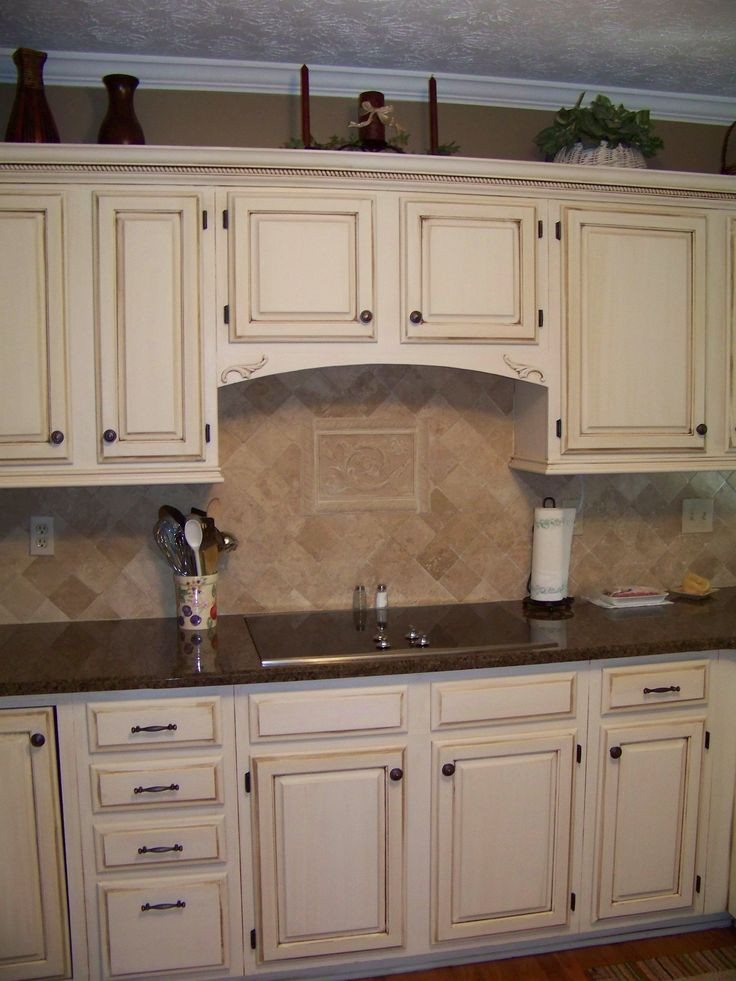 Best ideas about Cream Colored Kitchen Cabinets
. Save or Pin Cream Cabinets with dark brown glaze Now.