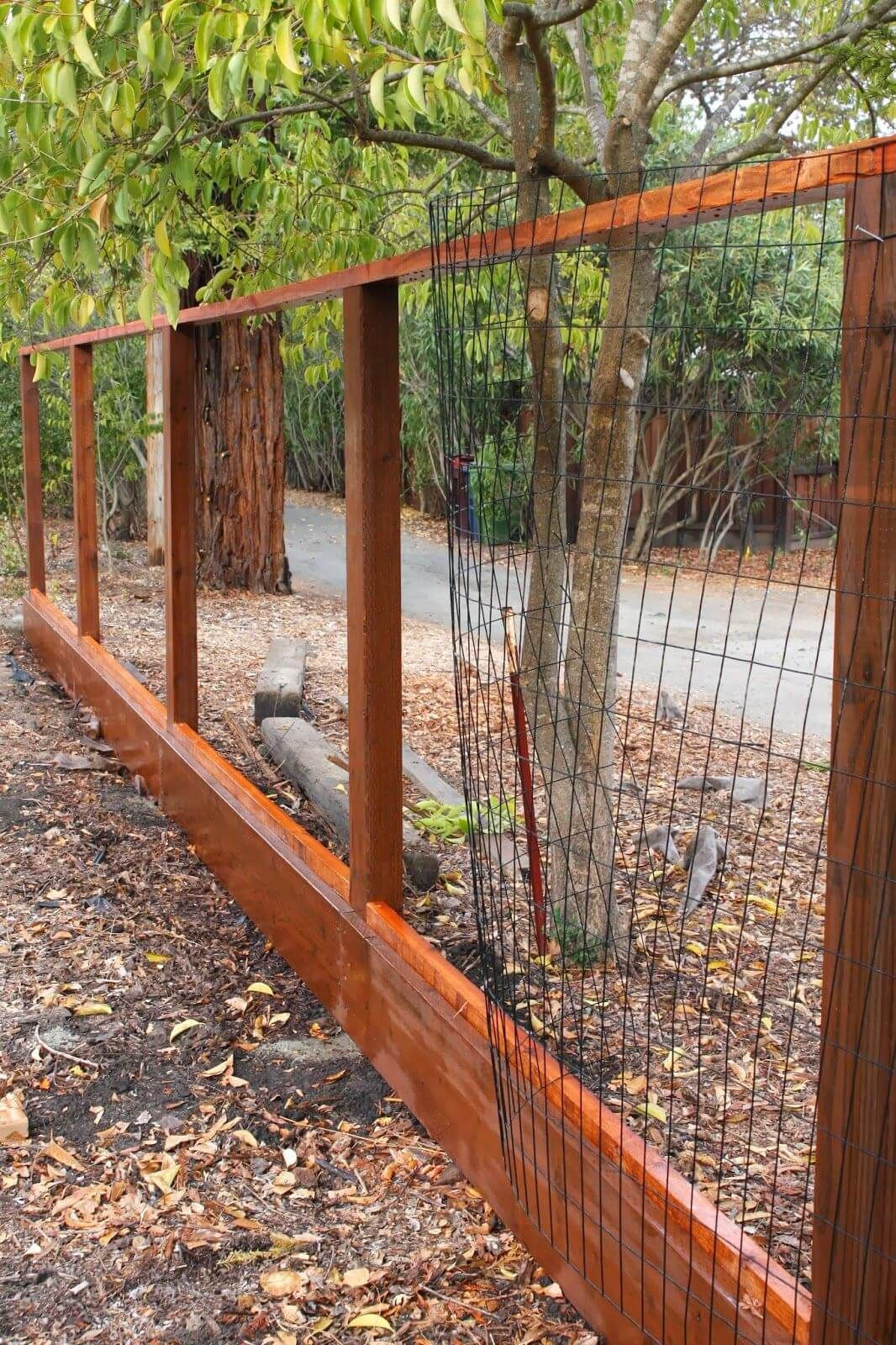 Best ideas about DIY Backyard Fence . Save or Pin Wood and Welded Wire Panel Fence Now.