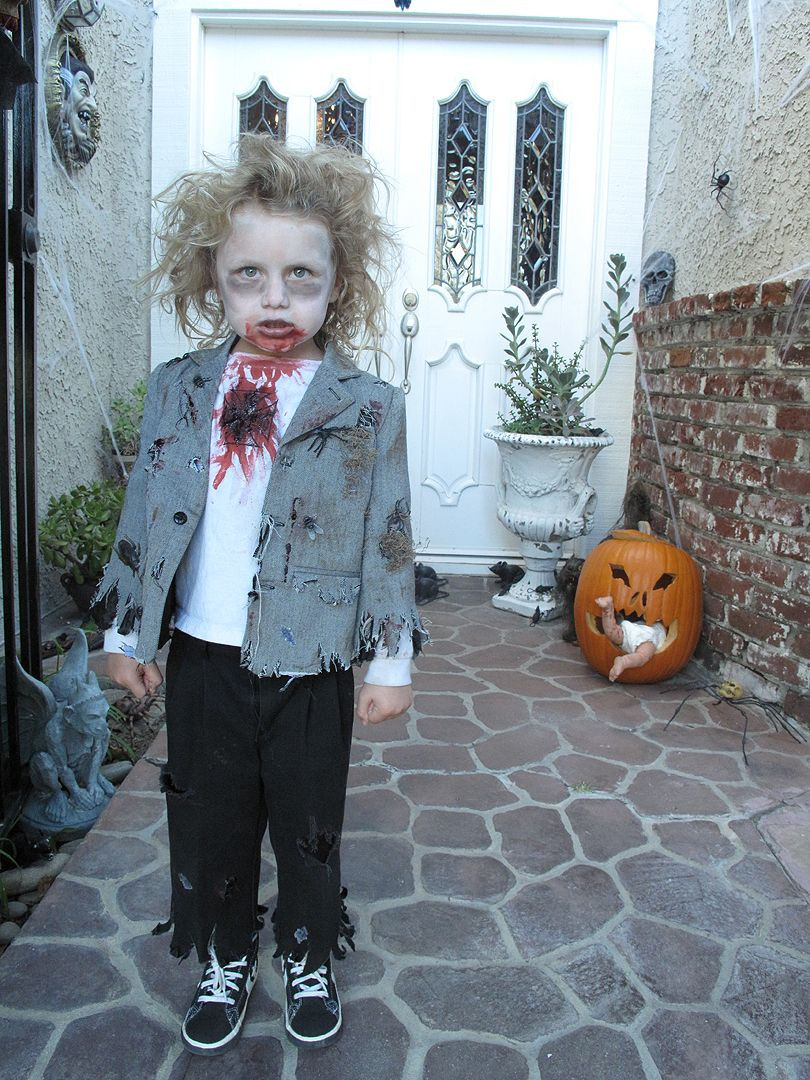 Best ideas about DIY Kids Zombie Costume
. Save or Pin the coolest zombie kid i know Now.