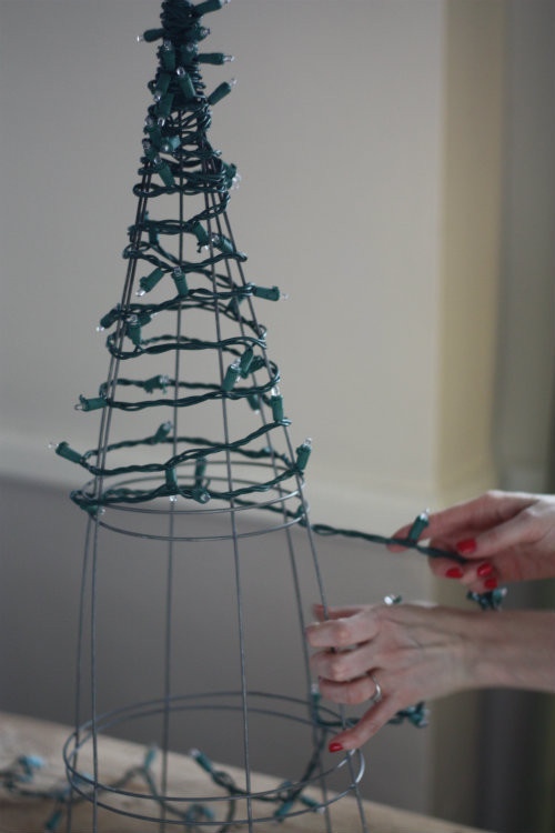 Best ideas about DIY Outdoor Christmas Tree Made Of Lights
. Save or Pin DIY Tomato Cage Christmas Tree Lights Now.