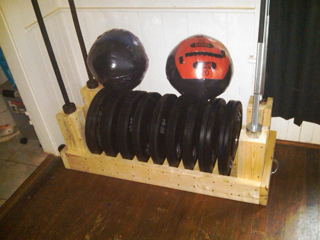 Best ideas about DIY Weight Plate Rack
. Save or Pin Great Design for a Plate Rack with Bar Storage photo 2 Now.