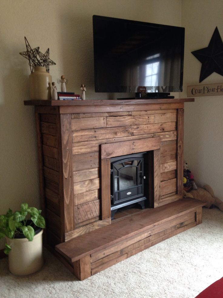 Best ideas about Fake Fireplace Tv Stand
. Save or Pin Pallet wood Faux Fireplace for electric fireplace Now.