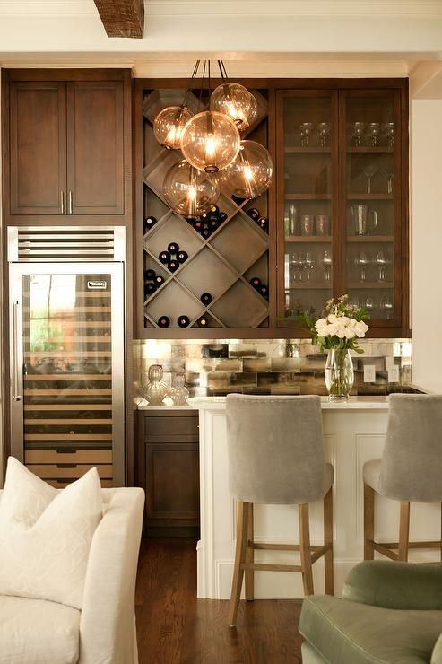 Best ideas about Family Room Bar
. Save or Pin Chic living room bar features dark stained shaker cabinets Now.