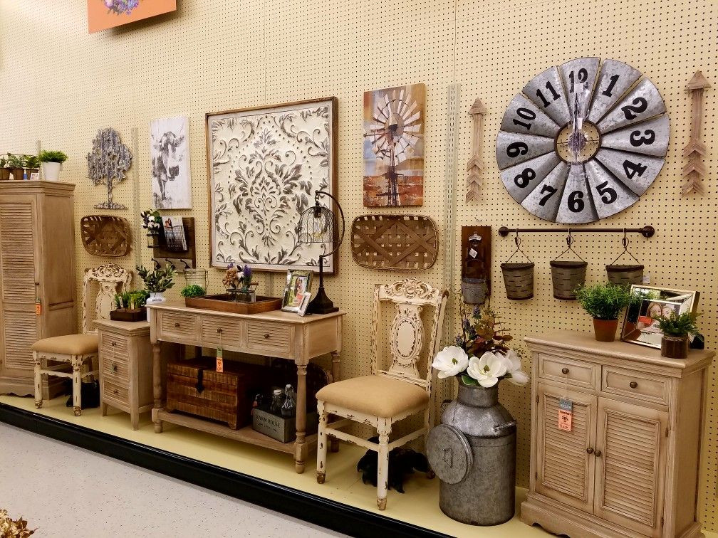 13. Hobby Lobby farmhouse furniture and wall decor display.