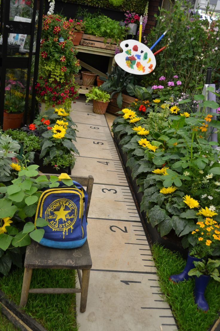 Best ideas about Kids Garden Ideas
. Save or Pin Ruler footpath lined with sunflowers ideal for kids garden Now.