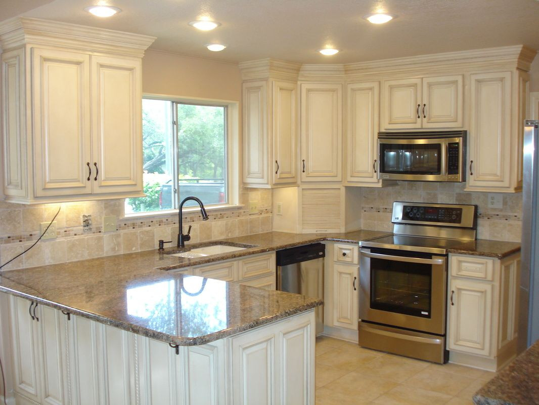 Best ideas about Kitchen Cabinets And Countertops
. Save or Pin 4 Day Cabinets white cabinets granite Corian countertop Now.