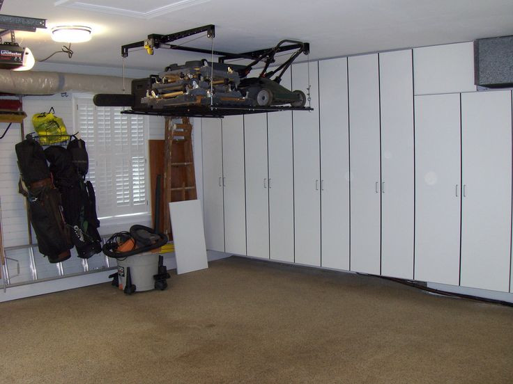Best ideas about Overhead Garage Storage Systems
. Save or Pin Lift for the lawnmower and stuff Now.
