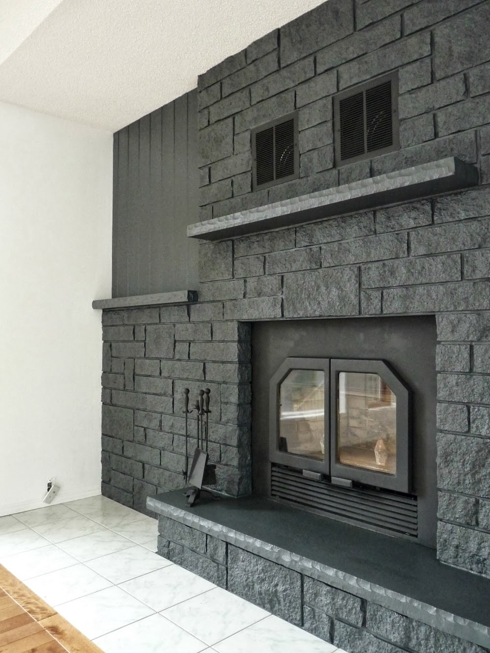 Best ideas about Painted Stone Fireplace
. Save or Pin How to Easily Paint a Stone Fireplace Charcoal Grey Now.