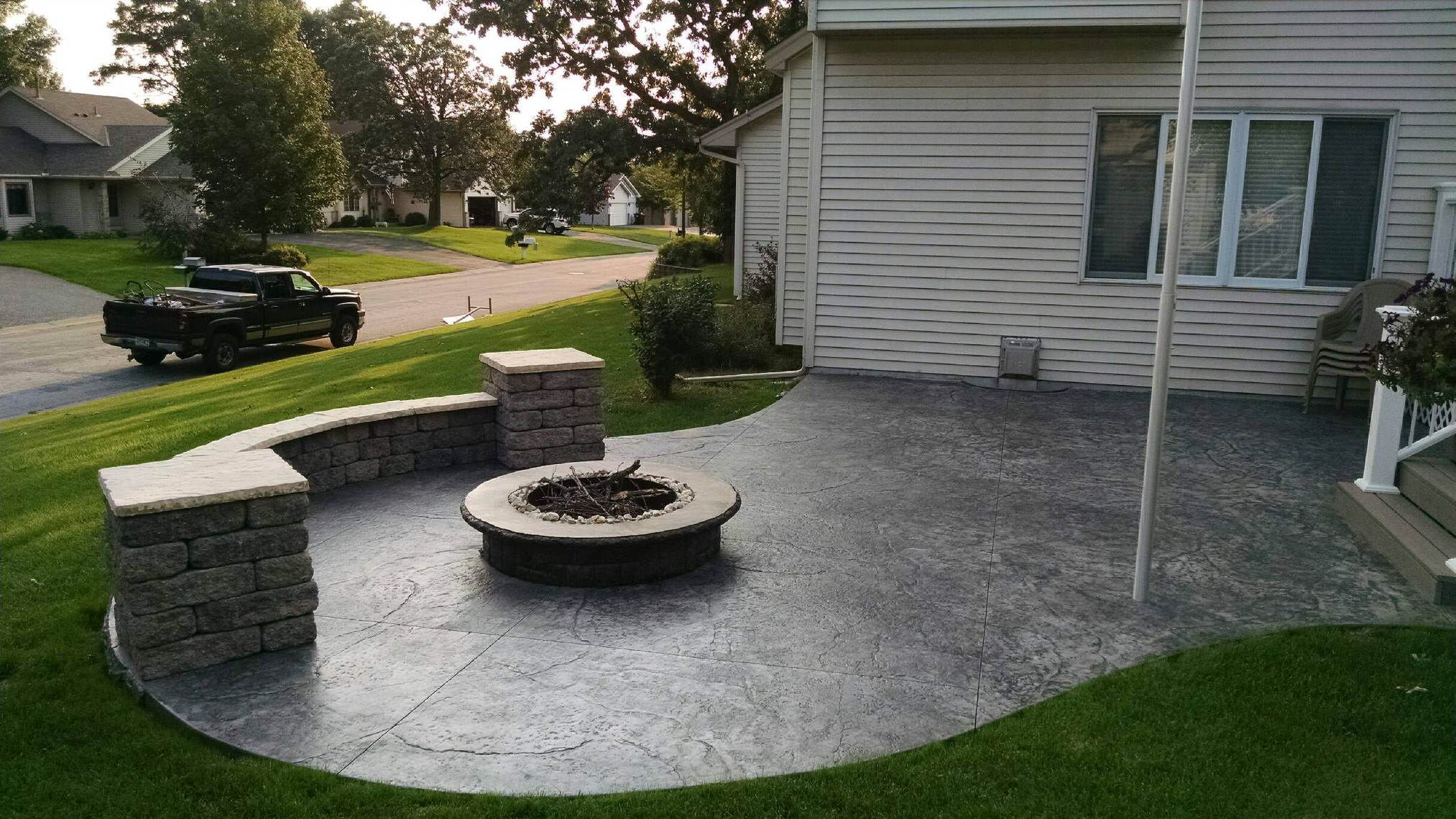 Best ideas about Poured Concrete Patio
. Save or Pin Stamped concrete patio with fire pit and seating walls by Now.