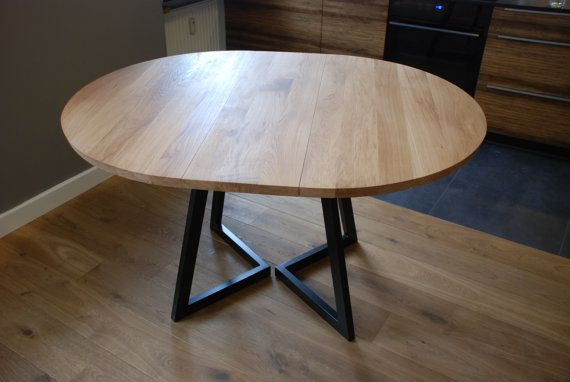 Best ideas about Round Extendable Dining Table
. Save or Pin Extendable round table modern design steel and timber Now.