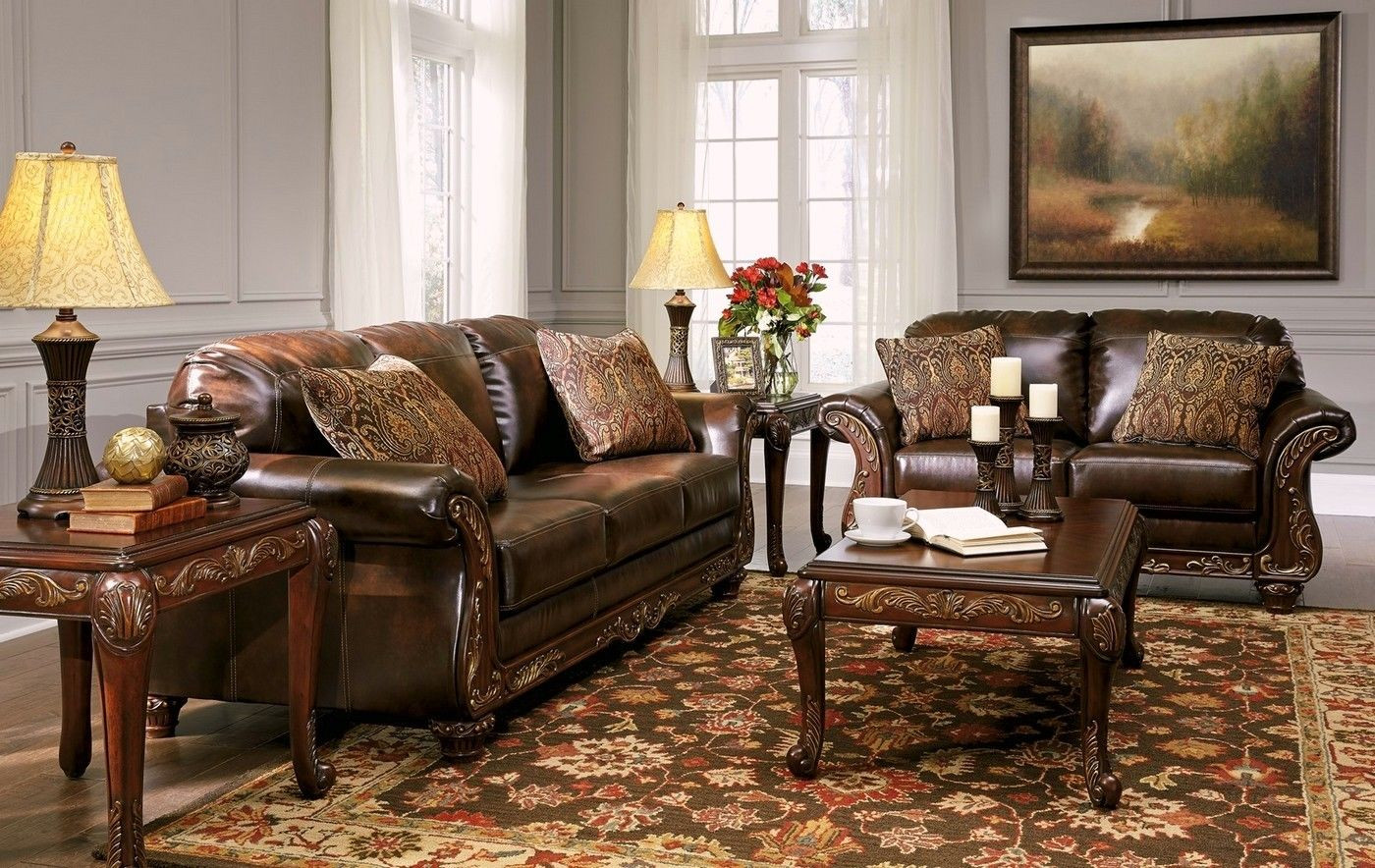 Best ideas about Sectional Living Room Sets
. Save or Pin Vanceton Brown Leather Traditional Wood Sofa & Loveseat Now.