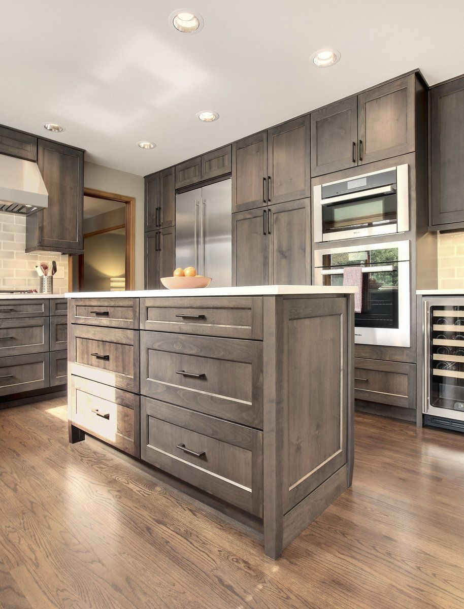 Best ideas about Stained Kitchen Cabinets
. Save or Pin alder gray stained cabinetry soft white quartz Now.