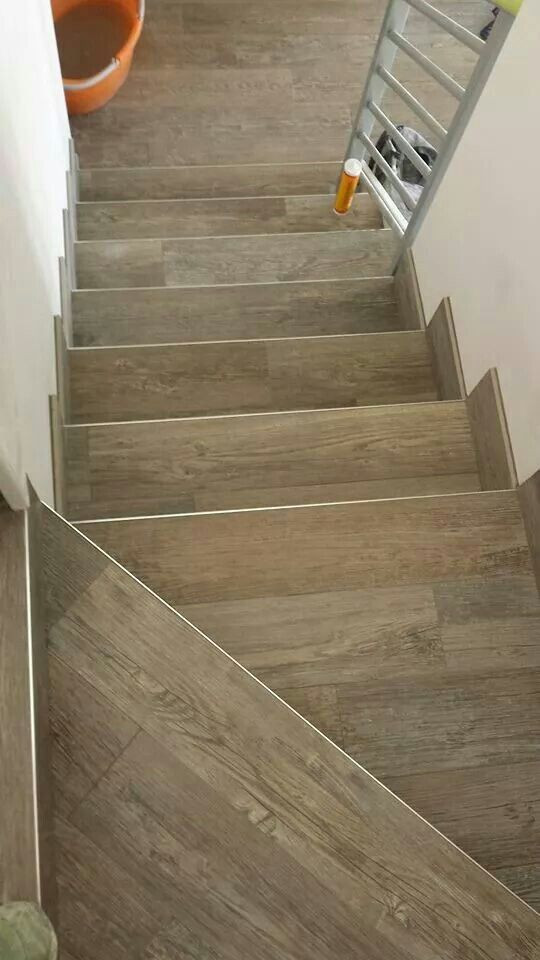 Best ideas about Tile On Stairs
. Save or Pin Wood look tiles stairs floor ideas Now.