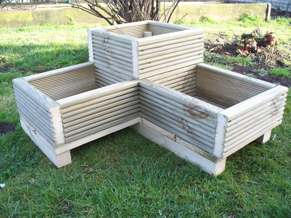 Best ideas about Wooden Garden Planters
. Save or Pin Corner Decking wooden garden planter wood trough L shaped Now.