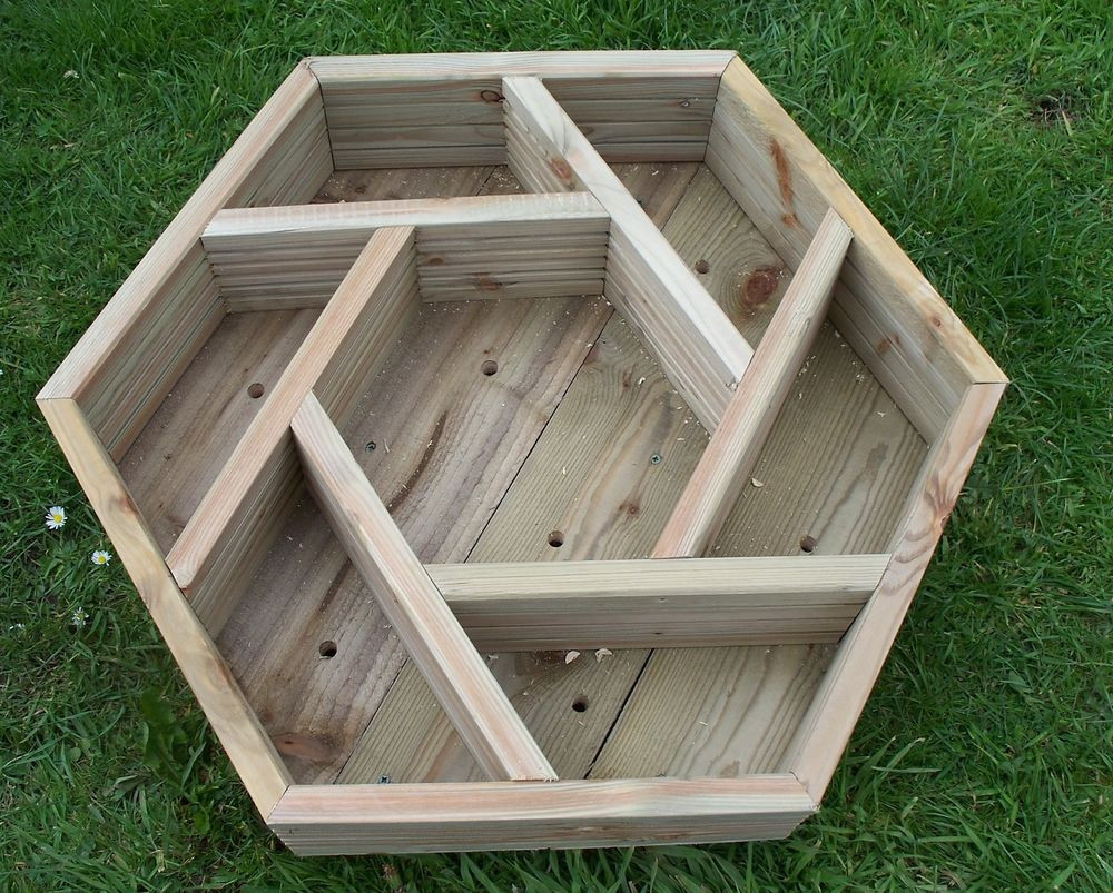 Best ideas about Wooden Garden Planters
. Save or Pin Wooden herb wheel planter wood trough timber hexagonal Now.