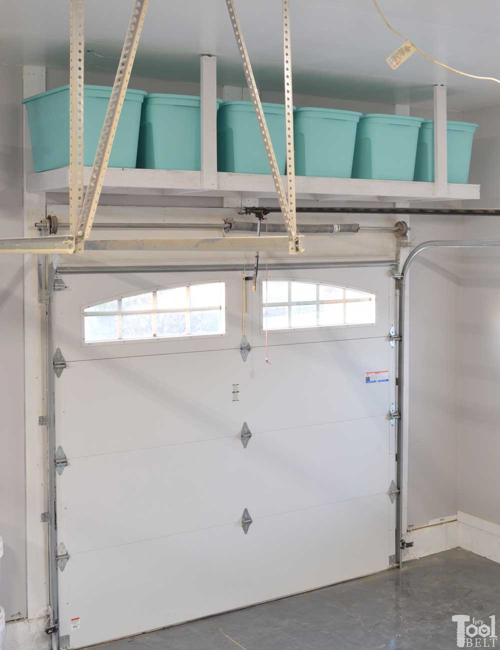 Best ideas about Above Garage Door Storage
. Save or Pin Overhead Garage Storage Shelf Her Tool Belt Now.