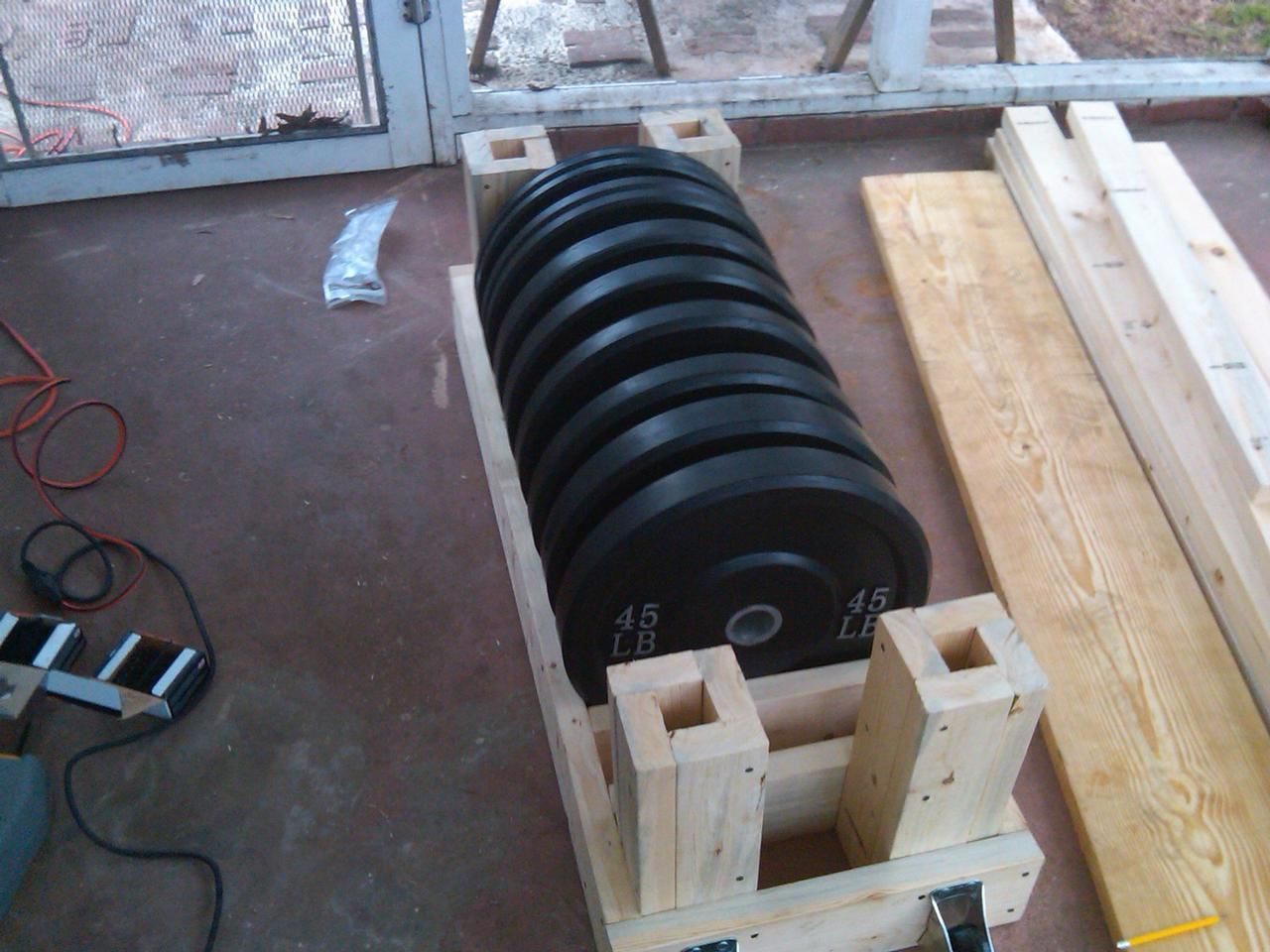 Best ideas about Bumper Plate Storage DIY
. Save or Pin Great Design for a Plate Rack with Bar Storage photo 1 Now.