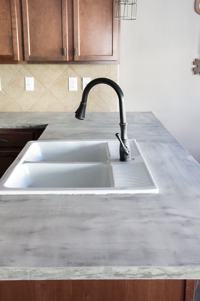 Best ideas about Cement Countertop DIY
. Save or Pin DIY Feather Finish Concrete Countertops Bless er House Now.