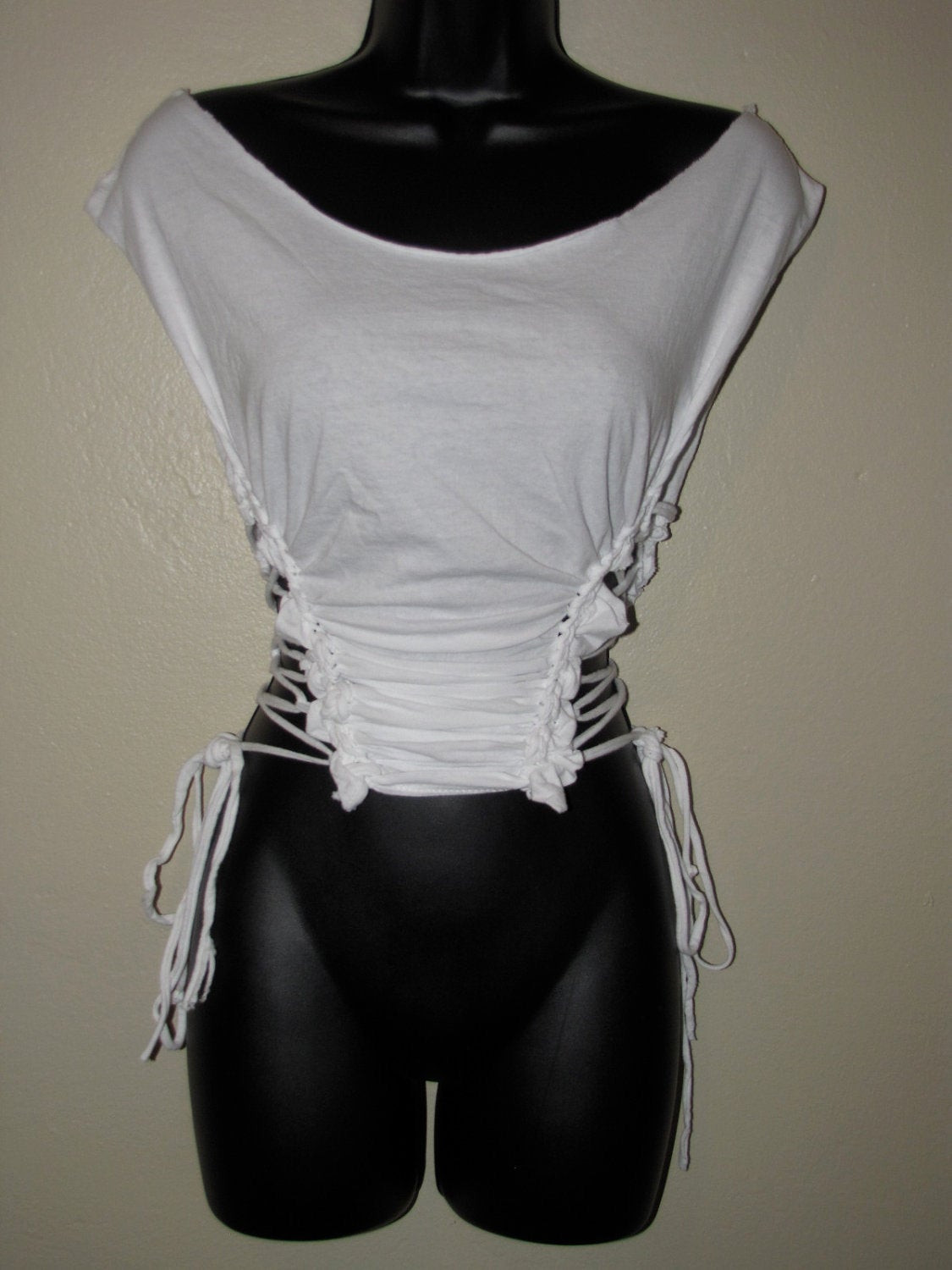 Best ideas about DIY Cutting T Shirts
. Save or Pin white cut out shredded DIY lace up t shirt Now.