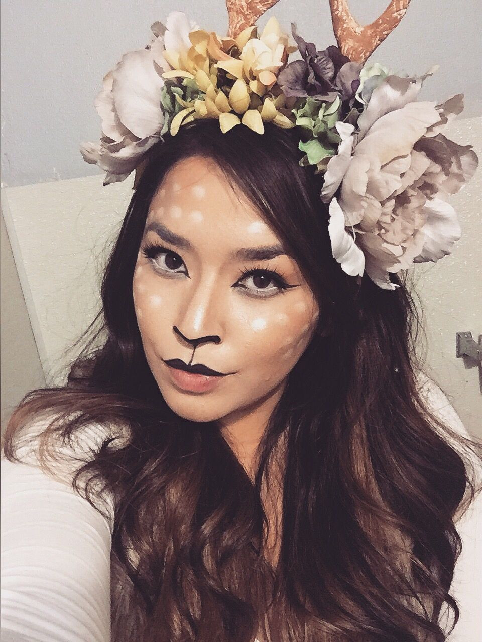 Best ideas about DIY Deer Antlers Costume
. Save or Pin Deer make up and flower crown with antlers for Halloween Now.