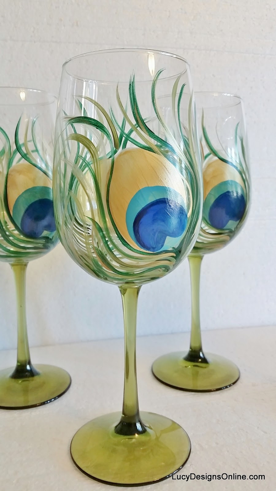 Best ideas about DIY Hand Painted Wine Glasses
. Save or Pin DIY Hand Painted Wine Glasses with Peacock Feather Design Now.