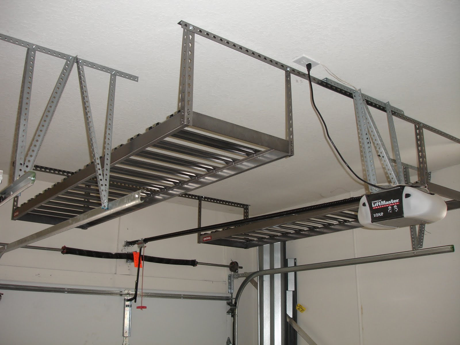 Best ideas about DIY Overhead Garage Storage
. Save or Pin Crowded Garage Overhead Storage Diy with White Wall Applied Now.