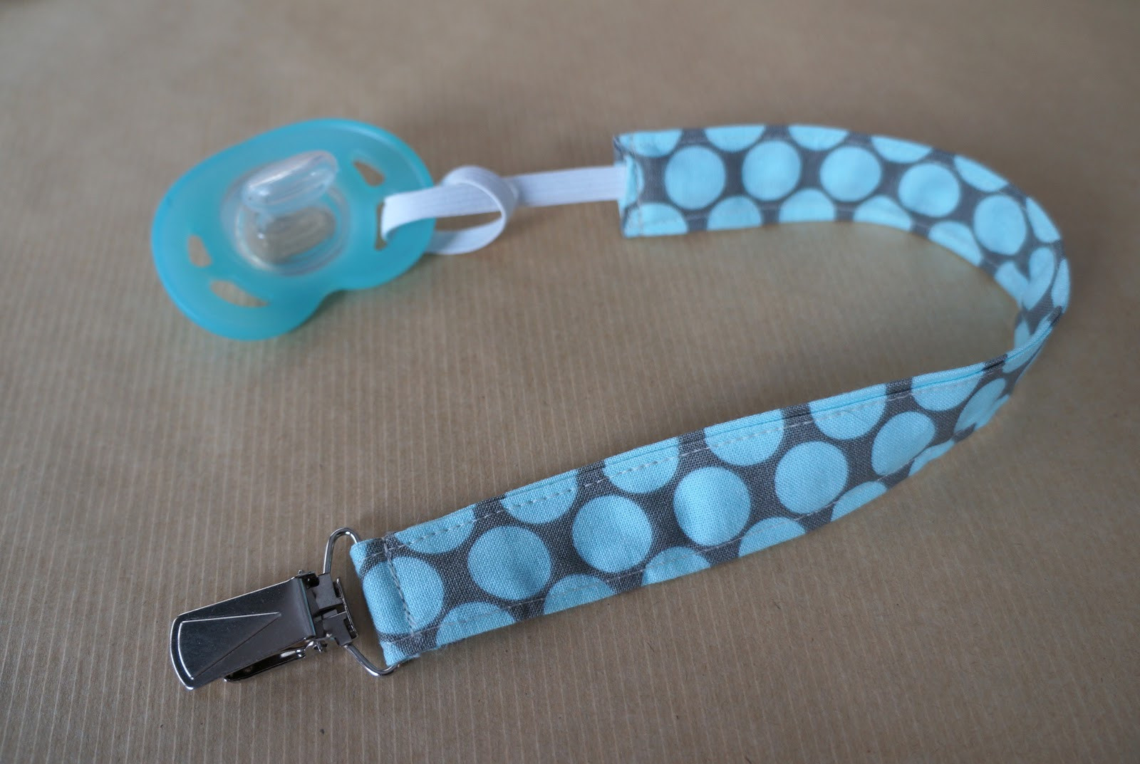 Best ideas about DIY Pacifier Clip
. Save or Pin Hardly Housewives DIY Pacifier Holder Now.