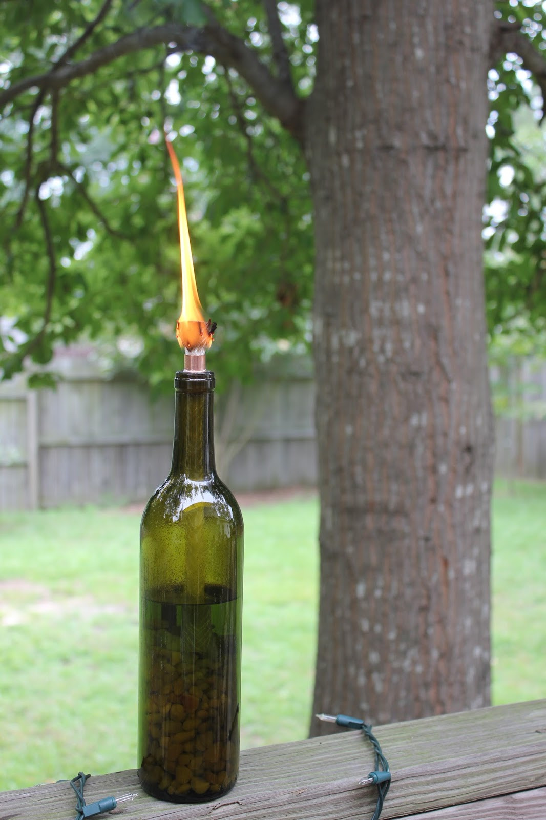 Best ideas about DIY Wine Bottle Tiki Torch
. Save or Pin Magnolia & Main DIY Wine Bottle TIki Torches Now.