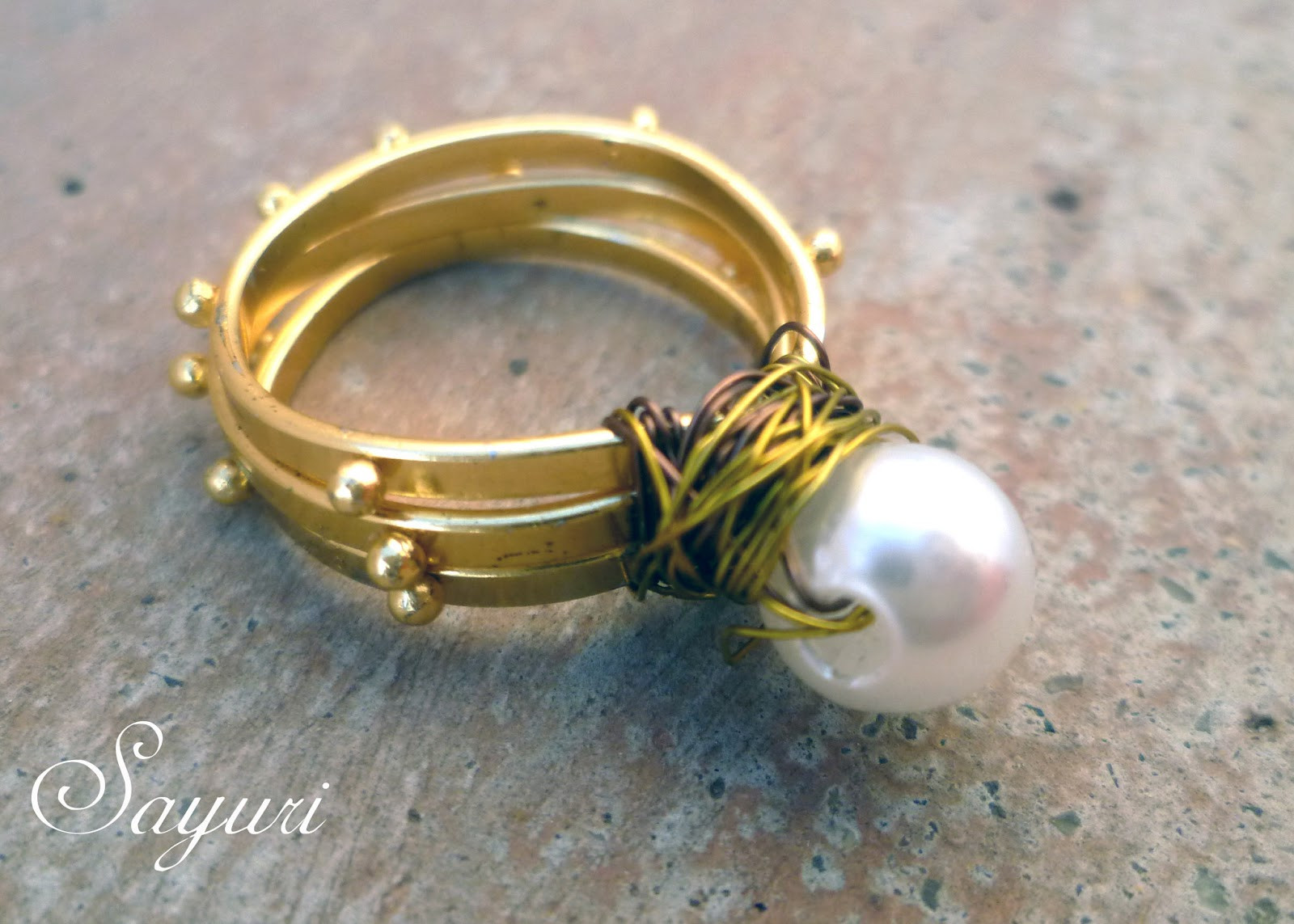 Best ideas about DIY Wire Rings
. Save or Pin DIY Patterned wire pearl ring Now.