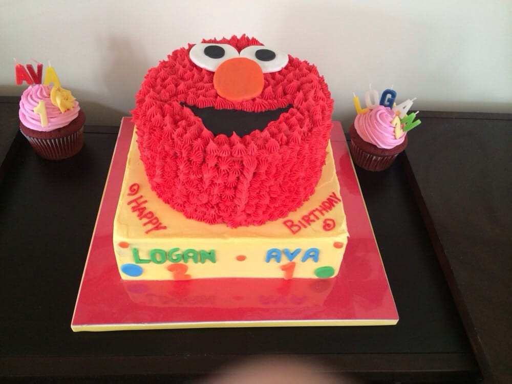 Best ideas about Elmo Birthday Party Ideas 2 Year Old
. Save or Pin Elmo cake and jumbo cupcakes for a joint 1 and 2 year old Now.